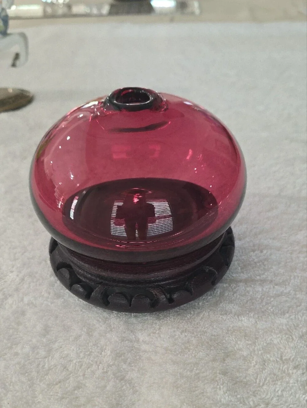 Decorative Ruby Red Glass Globe on Carved Wood Base